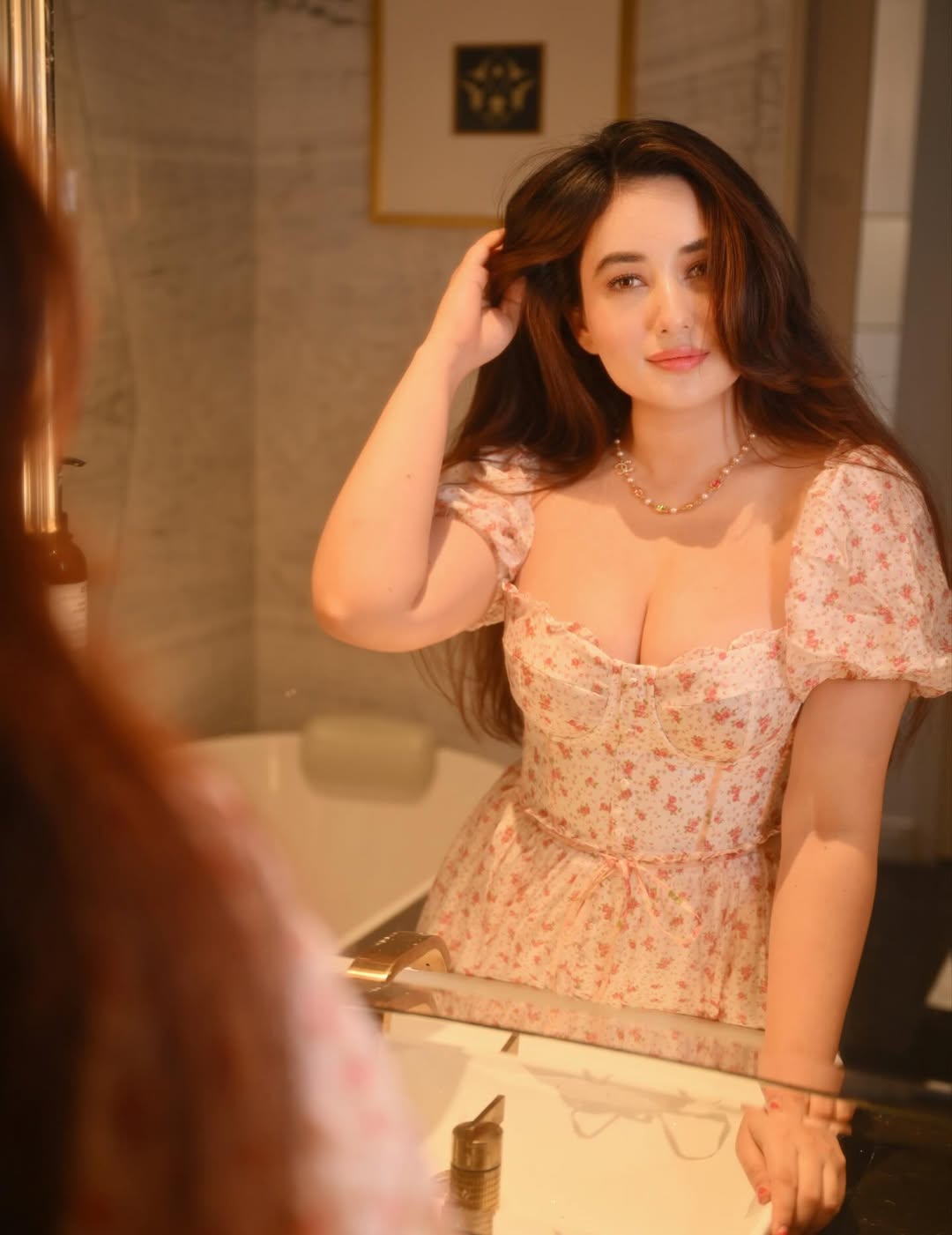 Aditi Budhathoki embodies graceful charm in a beautiful romantic floral ensemble.