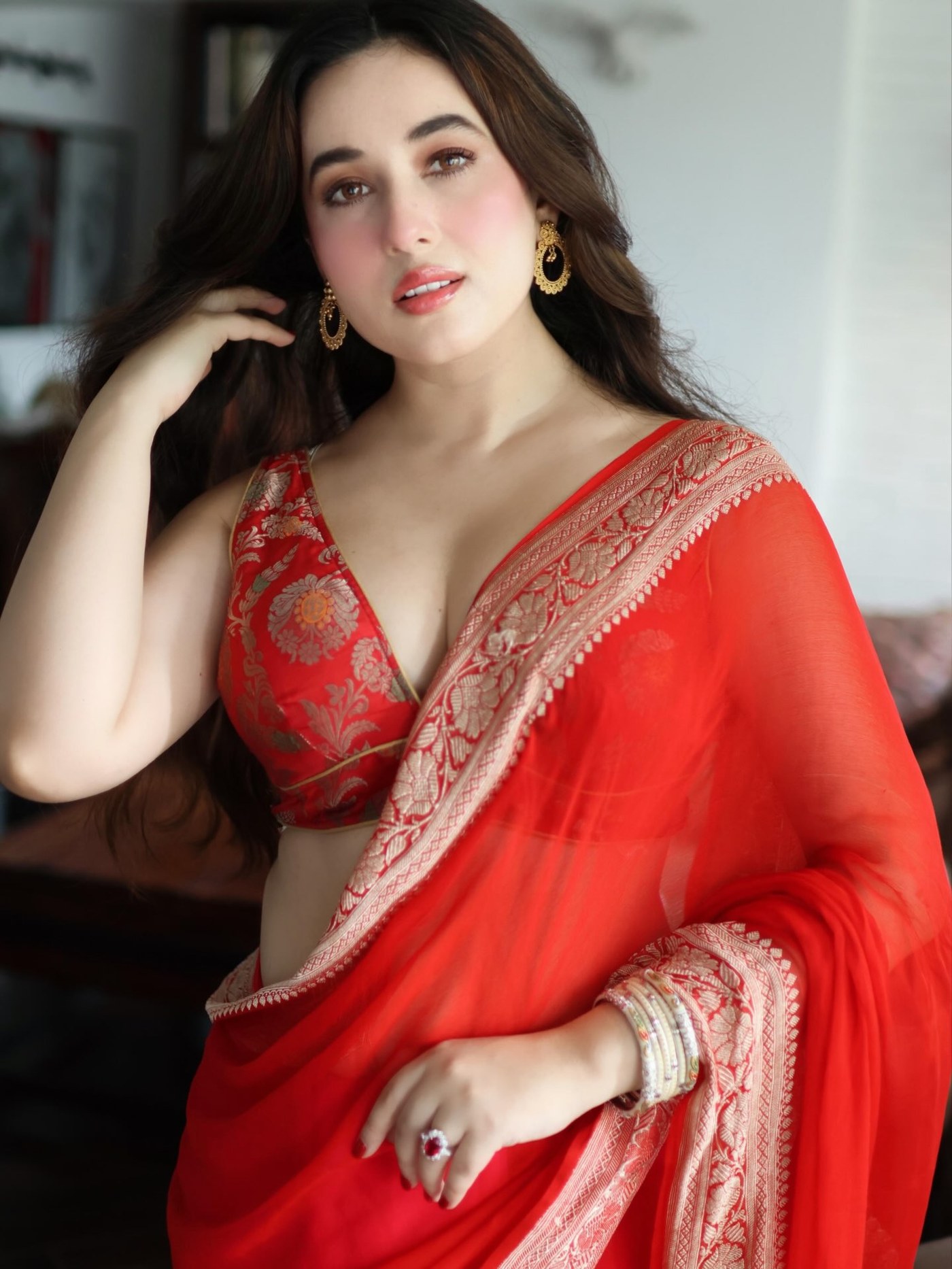 Aditi Budhathoki's Red Saree Magic: A Masterclass in Ethnic Glamour