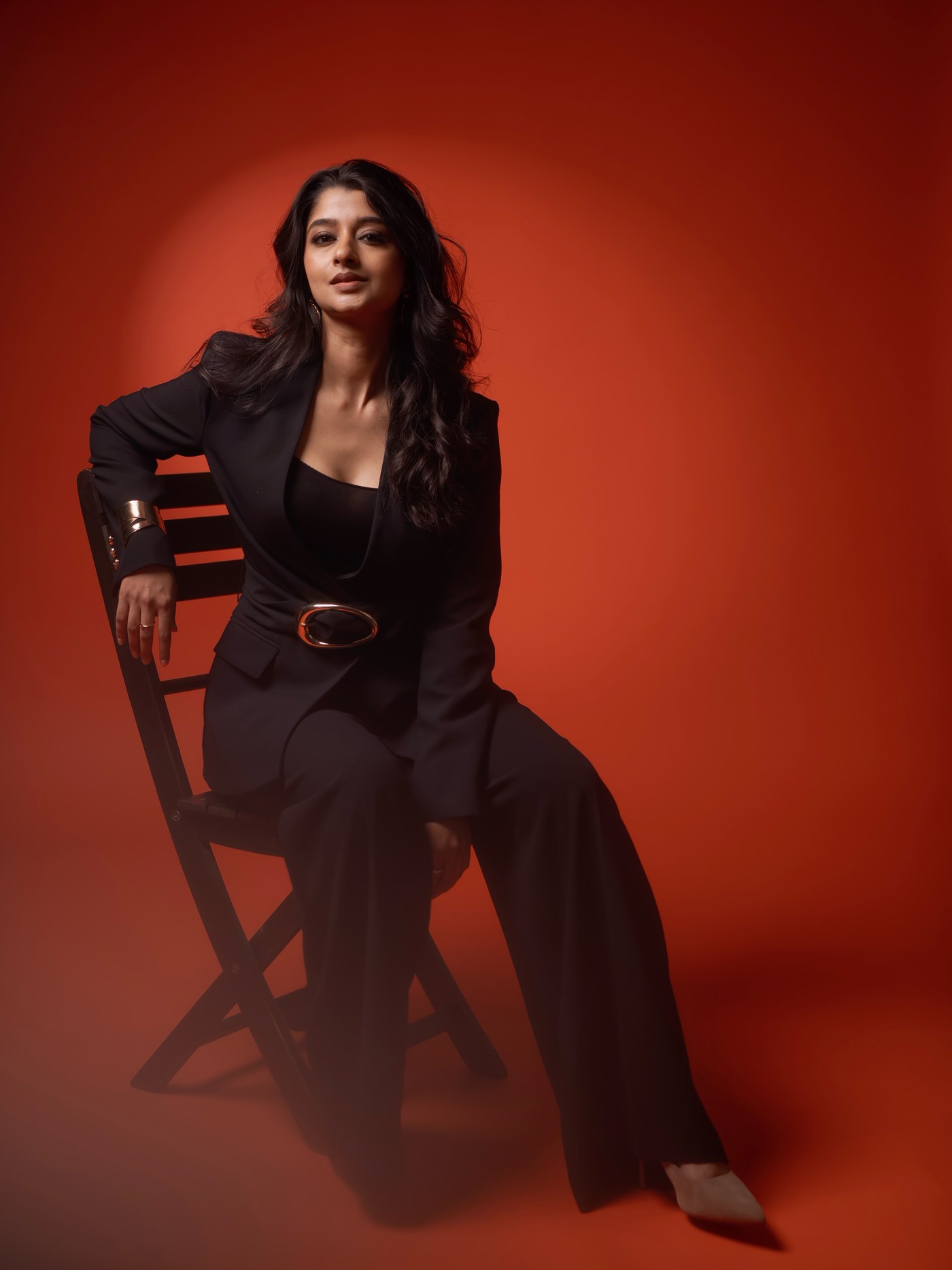 Aishani Shetty poses in sleek, tailored monochrome separates, showcasing confident modern style.