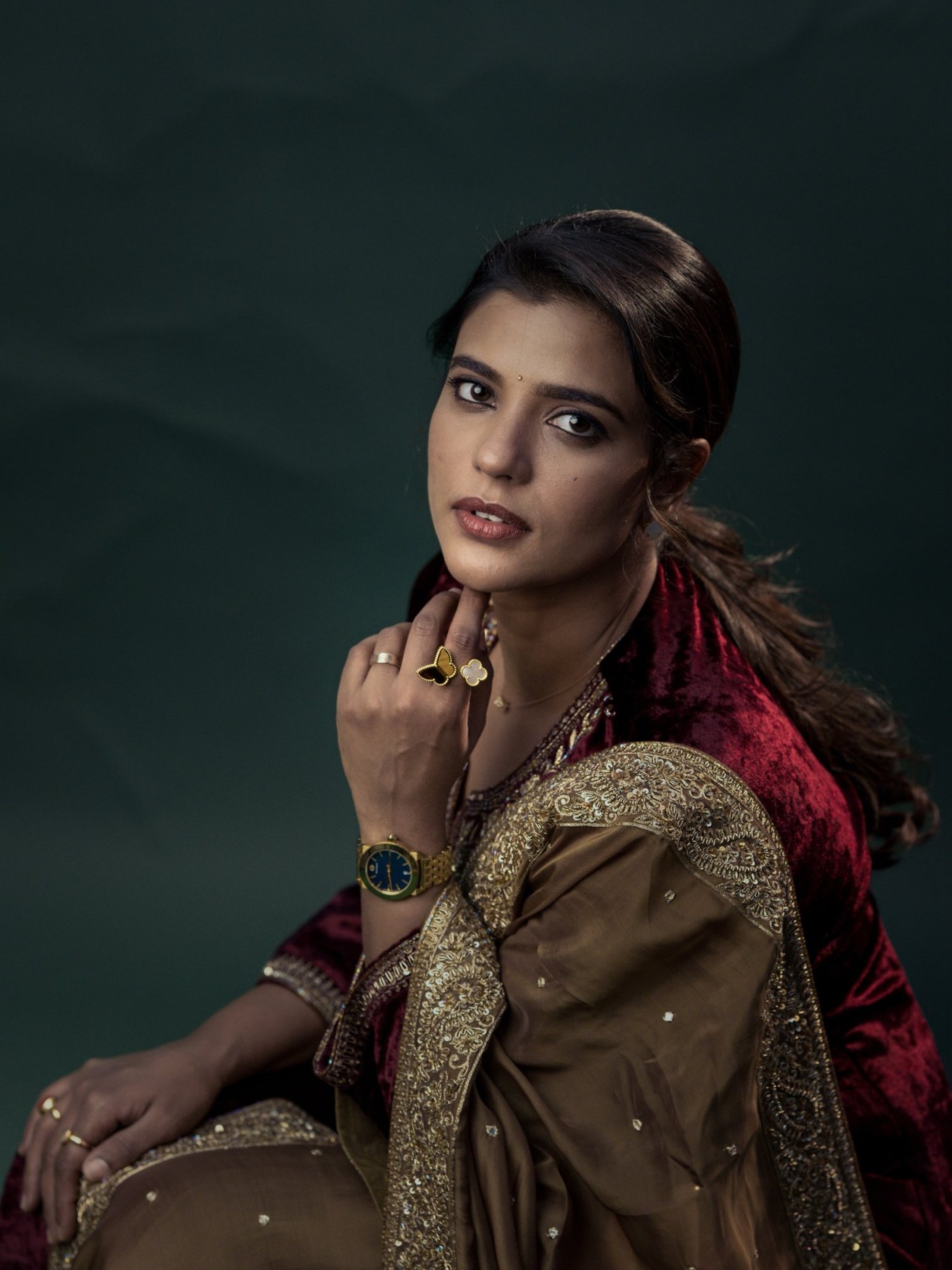 Aishwarya Rajesh showcases a beautiful, regal maroon ethnic ensemble perfect for festive celebrations.