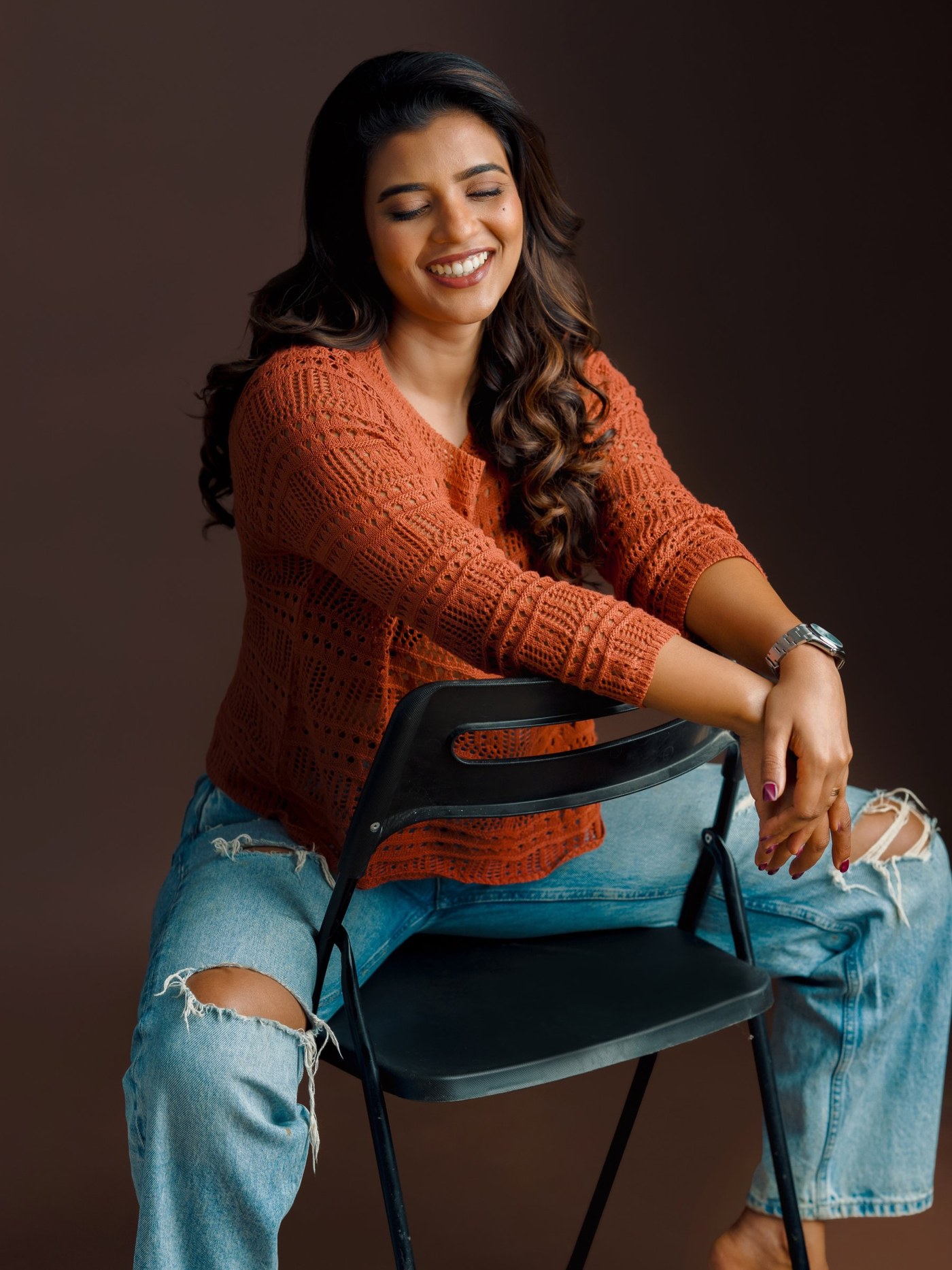 Aishwarya Rajesh’s Effortless Charm in Cozy Orange Knitwear