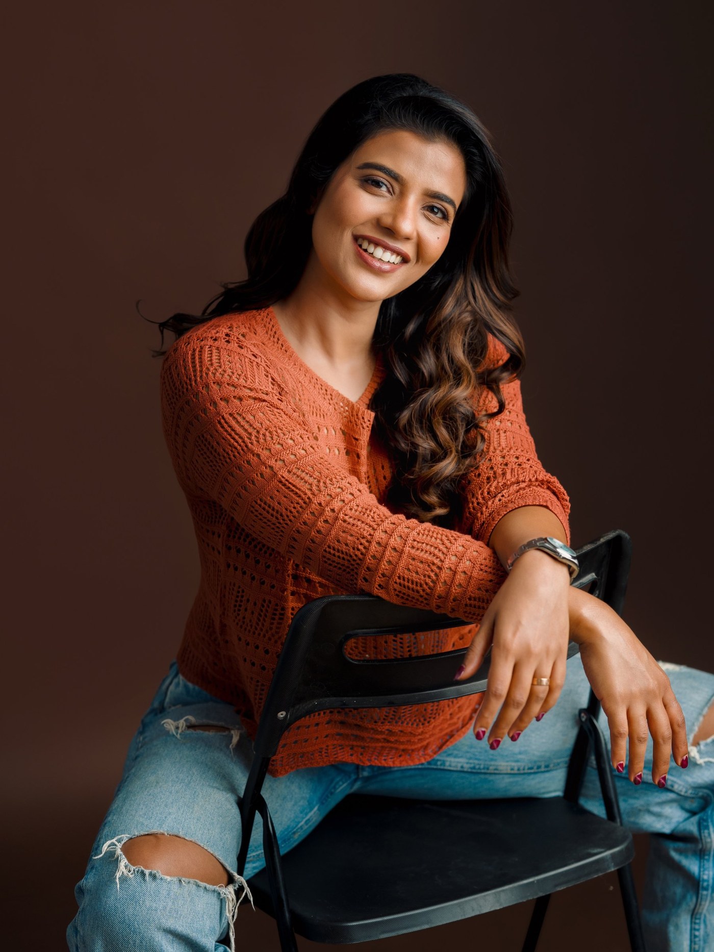 Aishwarya Rajesh’s Effortless Charm in Cozy Orange Knitwear