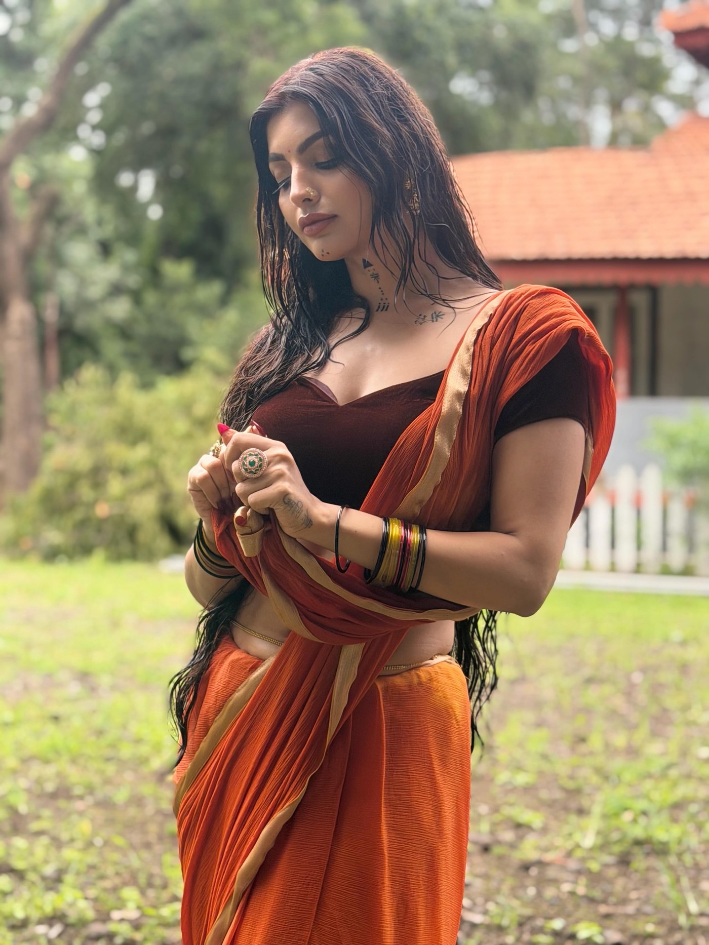 Orange and Black: Akanksha Puri Masters Colour Blocking in Saree
