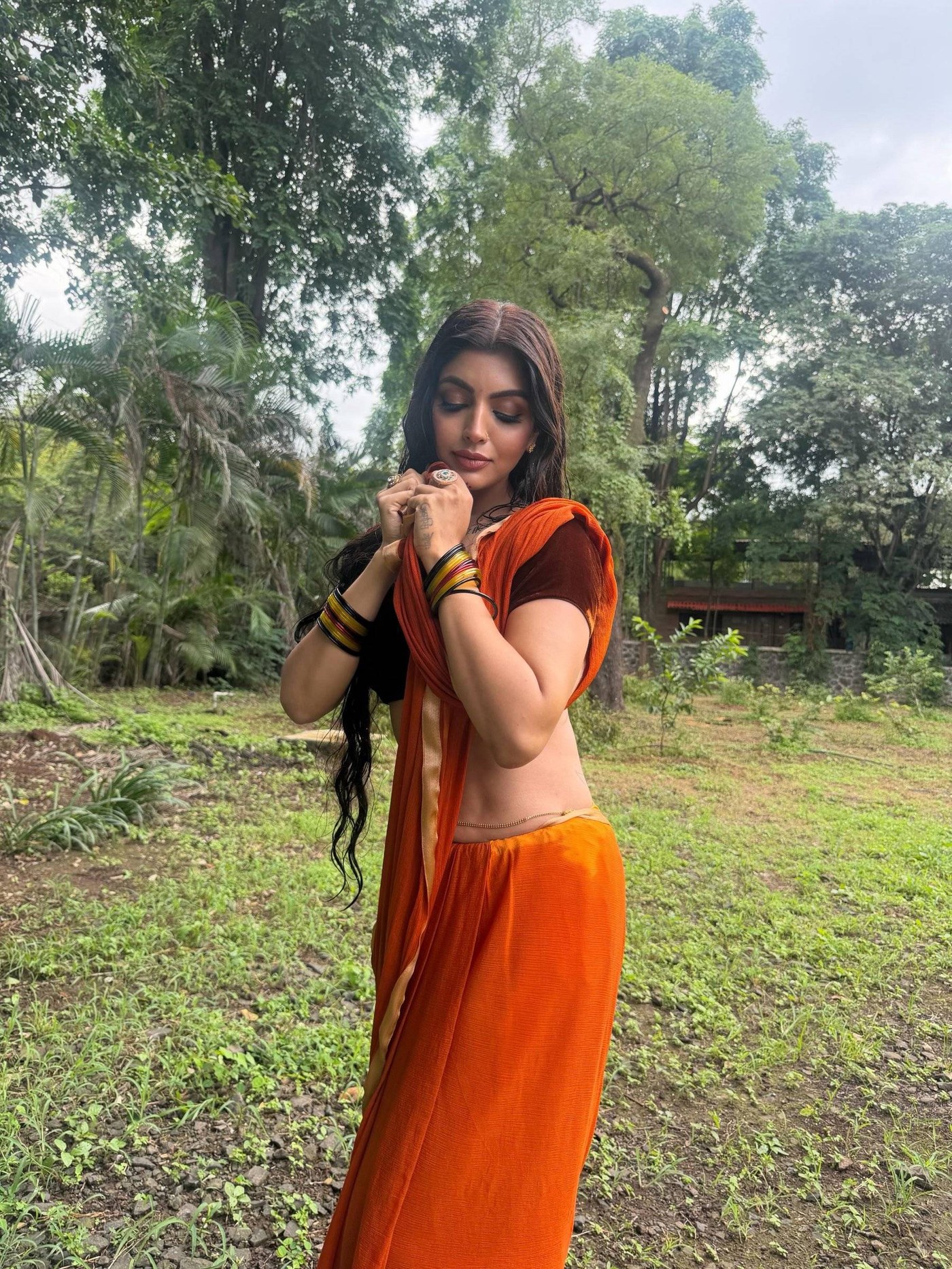 Orange and Black: Akanksha Puri Masters Colour Blocking in Saree