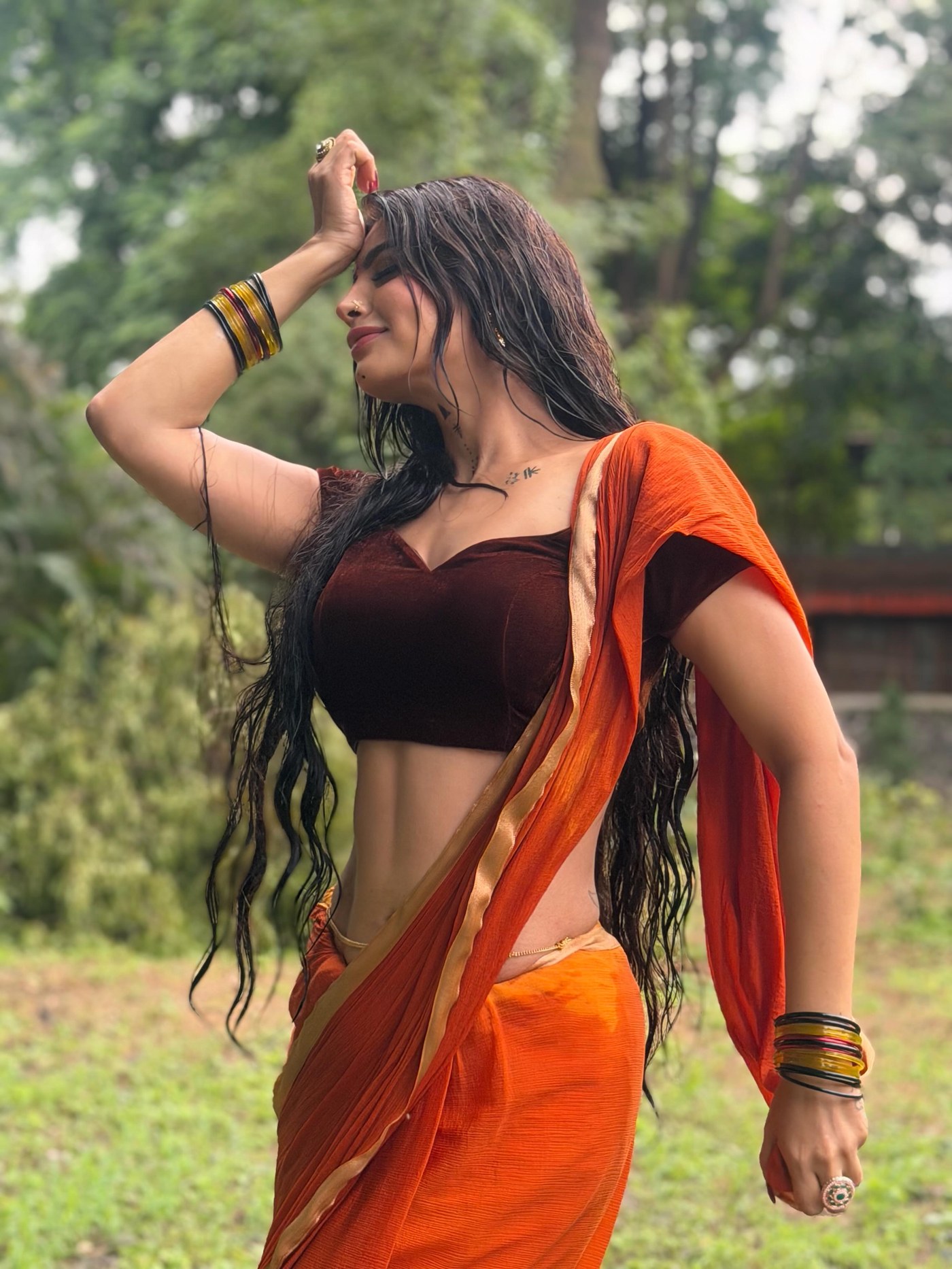 Orange and Black: Akanksha Puri Masters Colour Blocking in Saree