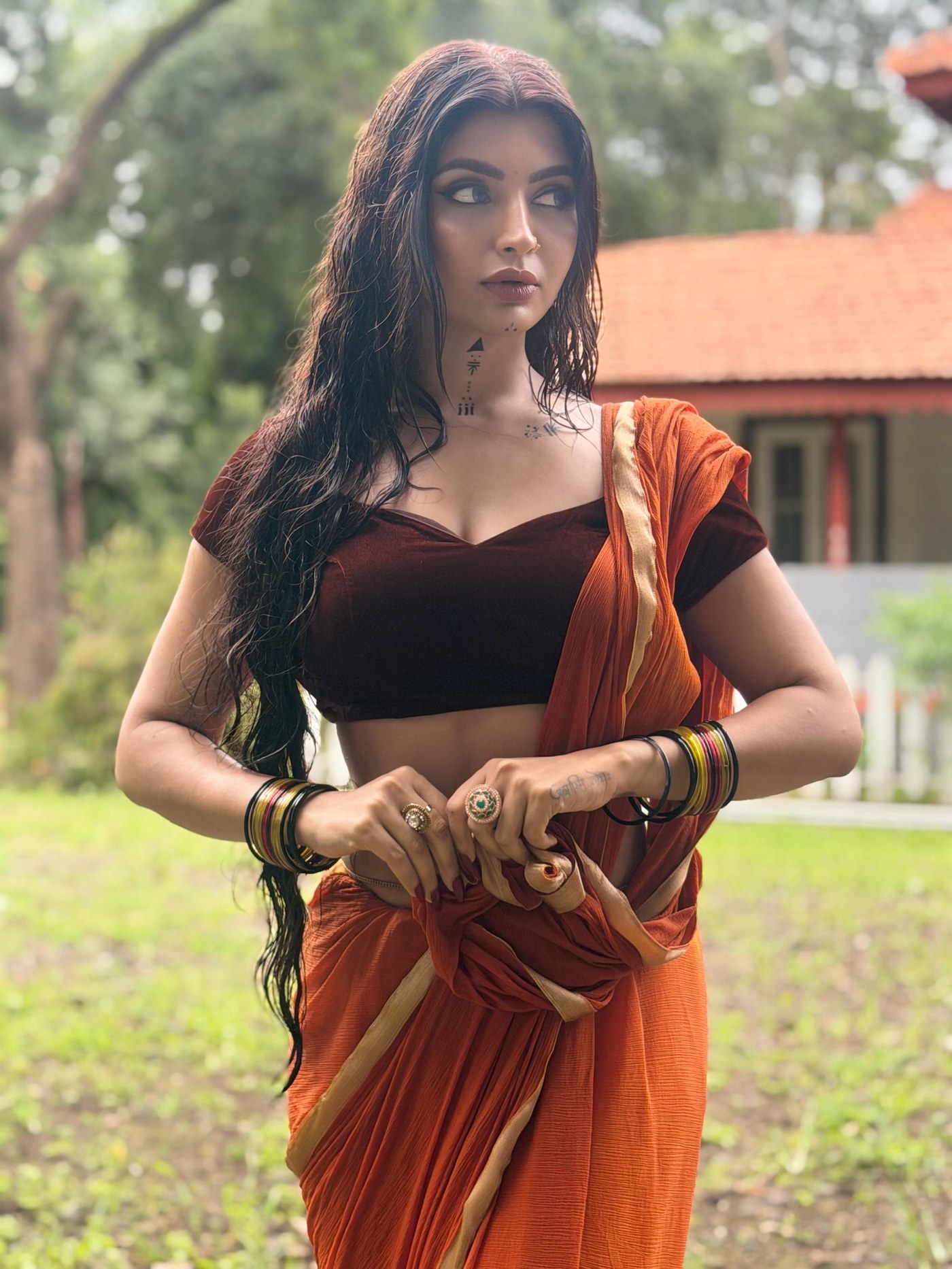 Orange and Black: Akanksha Puri Masters Colour Blocking in Saree
