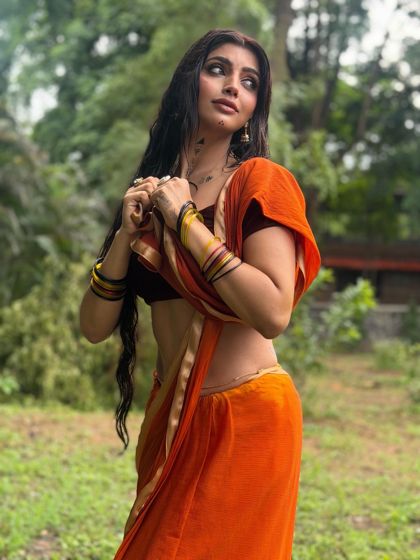 Orange and Black: Akanksha Puri Masters Colour Blocking in Saree