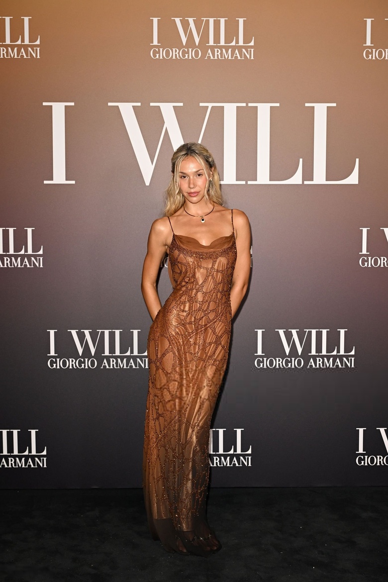 Alexis Ren arrives at a major event, radiating effortless style and timeless beauty. - Photos & Updates