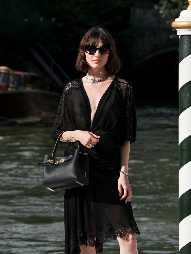 Alice Pagani Captures Golden Glow at Venice Film Festival