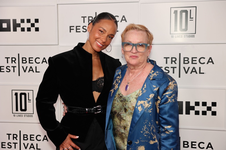 Alicia Keys posing on a red carpet at the 'Girl From Hell's Kitchen' Premiere at the 25th Tribeca Festival in New York
