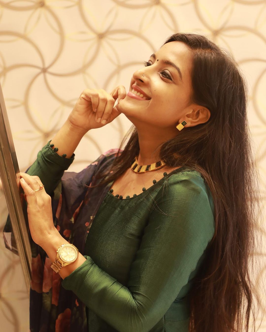 Alphy Panjikaran: Embracing Regal Elegance in Emerald Green