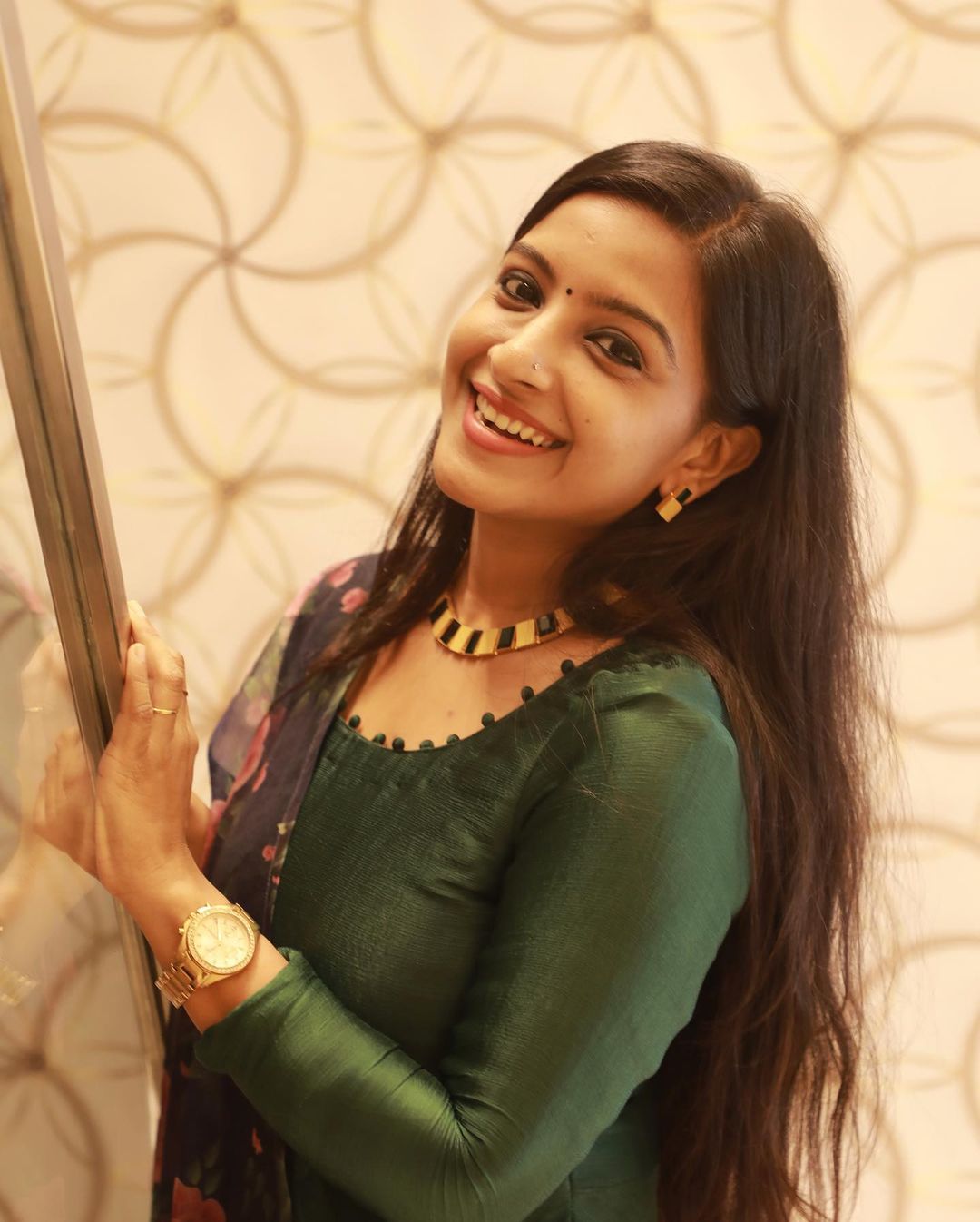 Alphy Panjikaran: Embracing Regal Elegance in Emerald Green