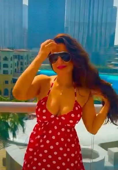 Patel's Dubai Polka Dot Look Against Cityscape