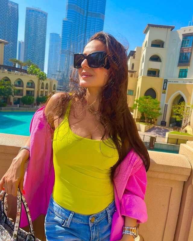 Patel's Dubai Polka Dot Look Against Cityscape