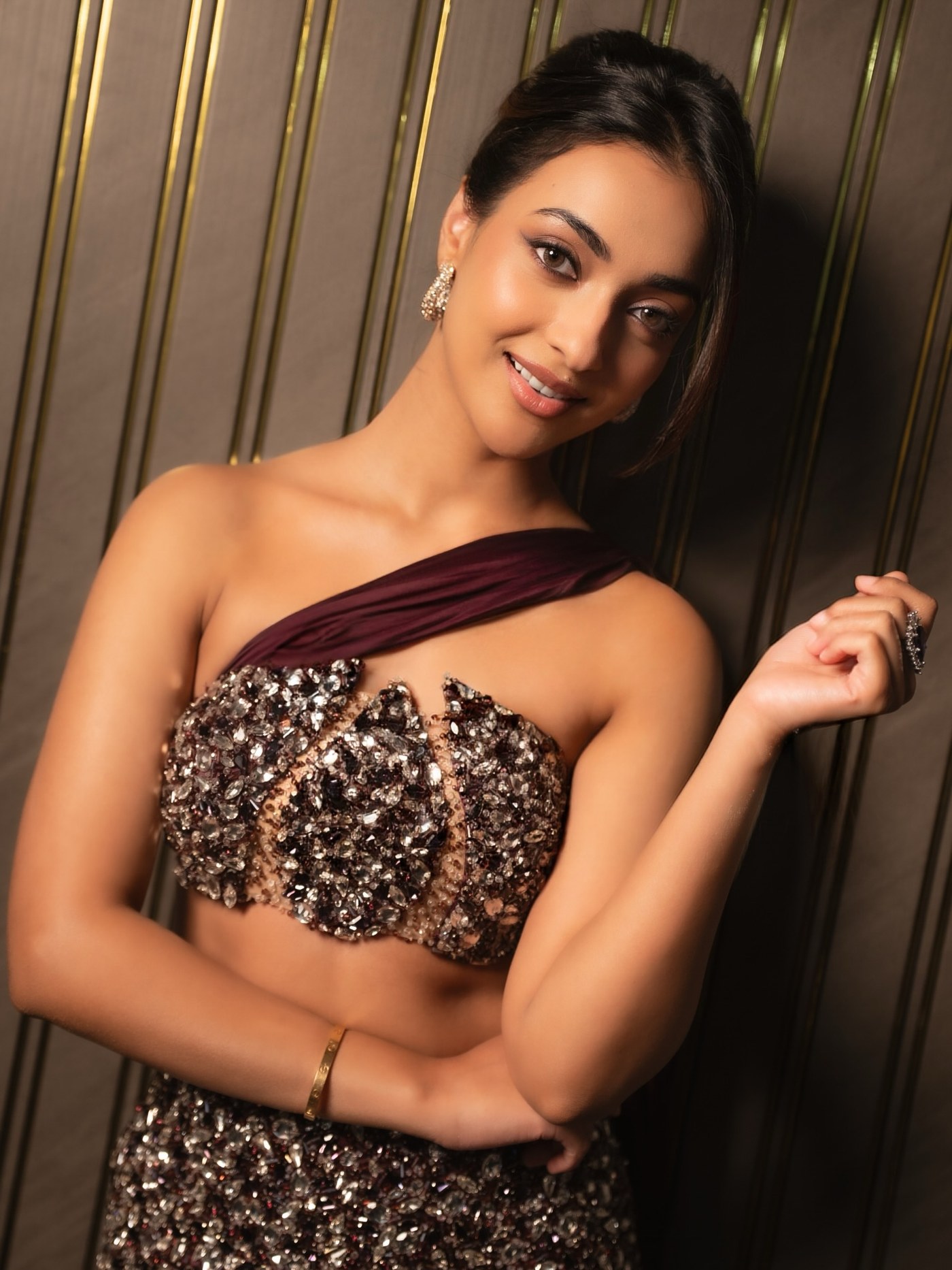 Amrin Qureshi shines in a glamorous, embellished ensemble perfect for festive celebrations.