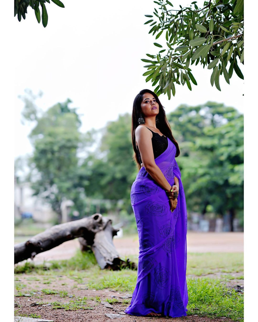 Anasuya Bharadwaj in Stunning Purple Attire