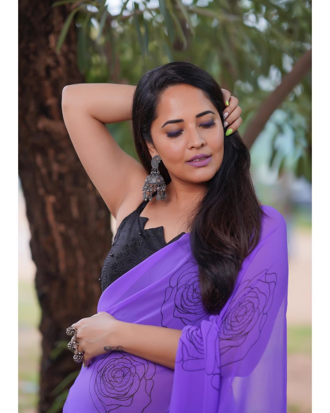 Anasuya Bharadwaj in Stunning Purple Attire
