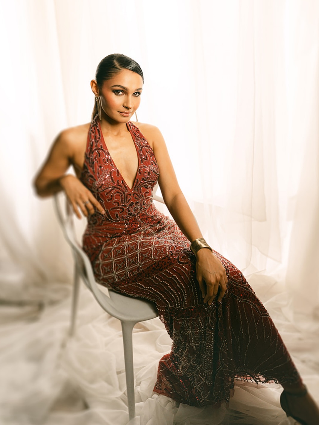 Rust Tones and Denim: Andrea Jeremiah's Minimalist Style Moment