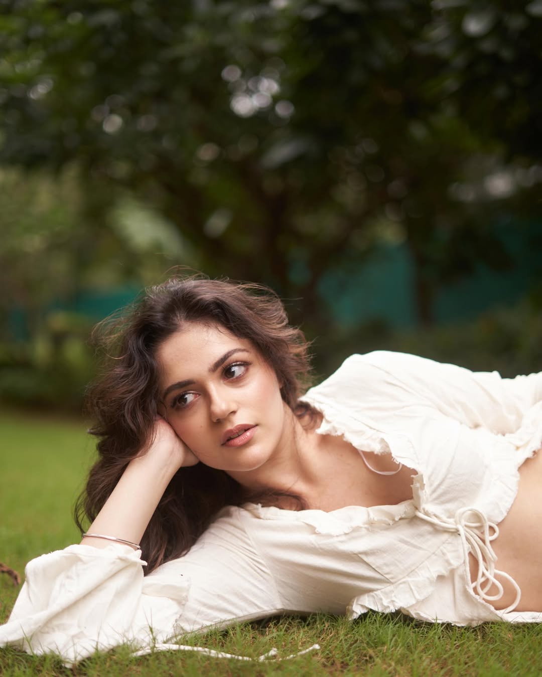 Aneet Padda posing confidently in a striking ensemble with elegant accessories.