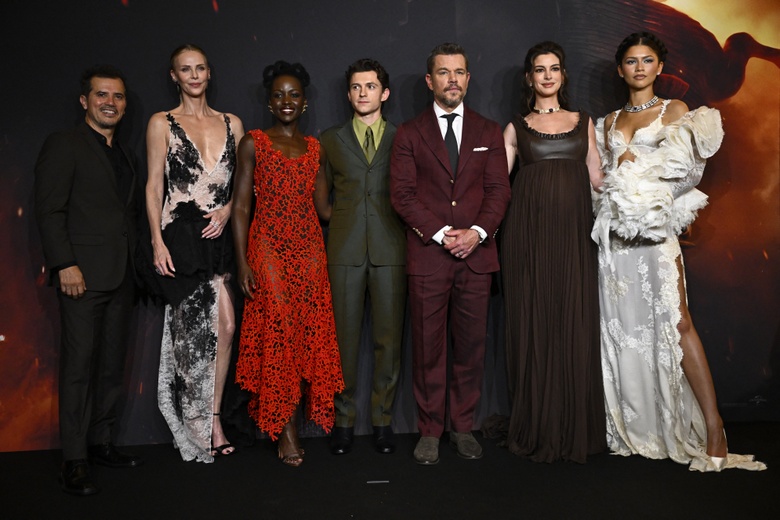 Anne Hathaway graces a premiere, looking elegant and radiant in an exquisite ensemble.