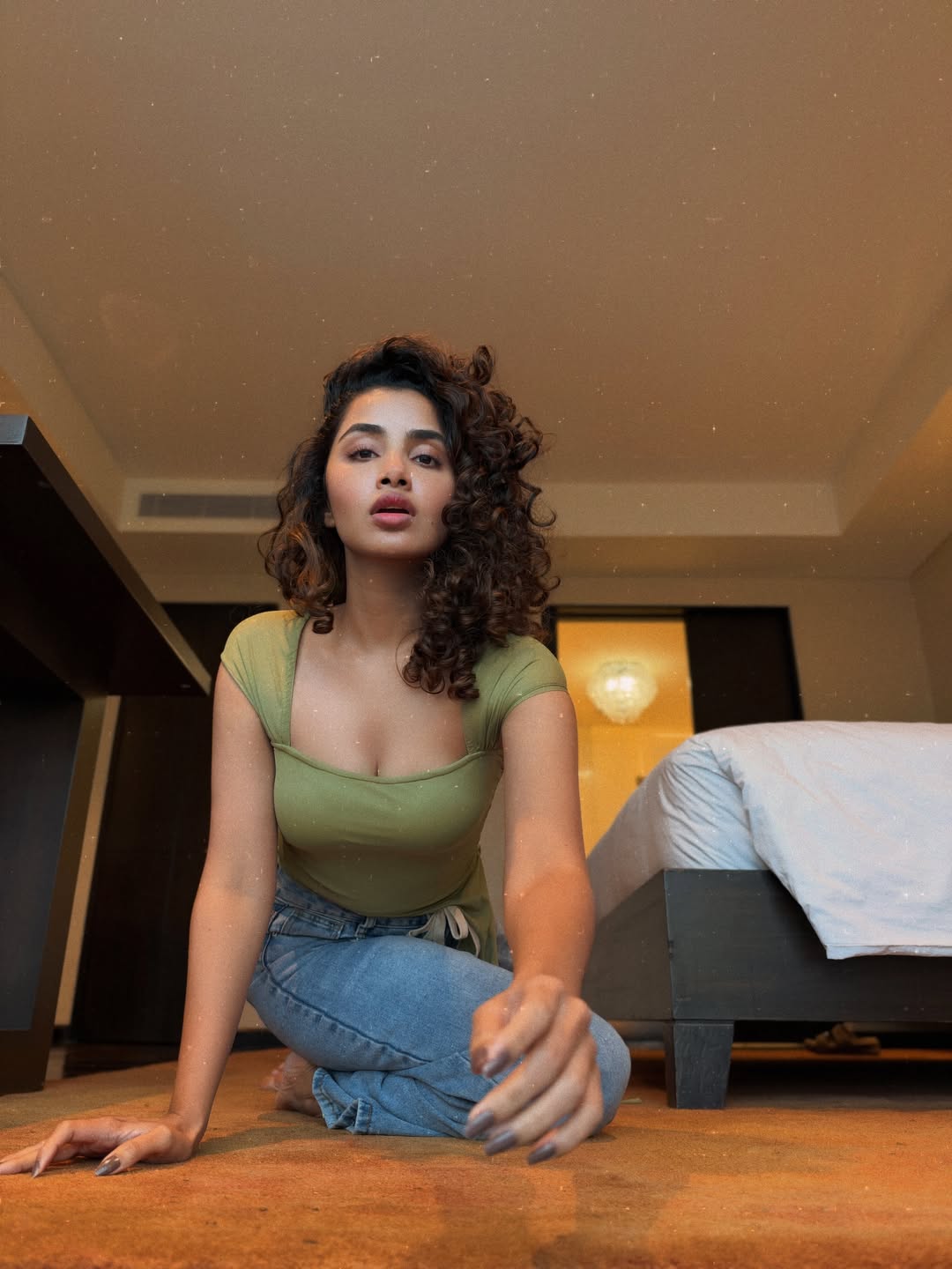 Anupama Parameswaran shows off her curls in a simple, stylish look. - Photos & Updates