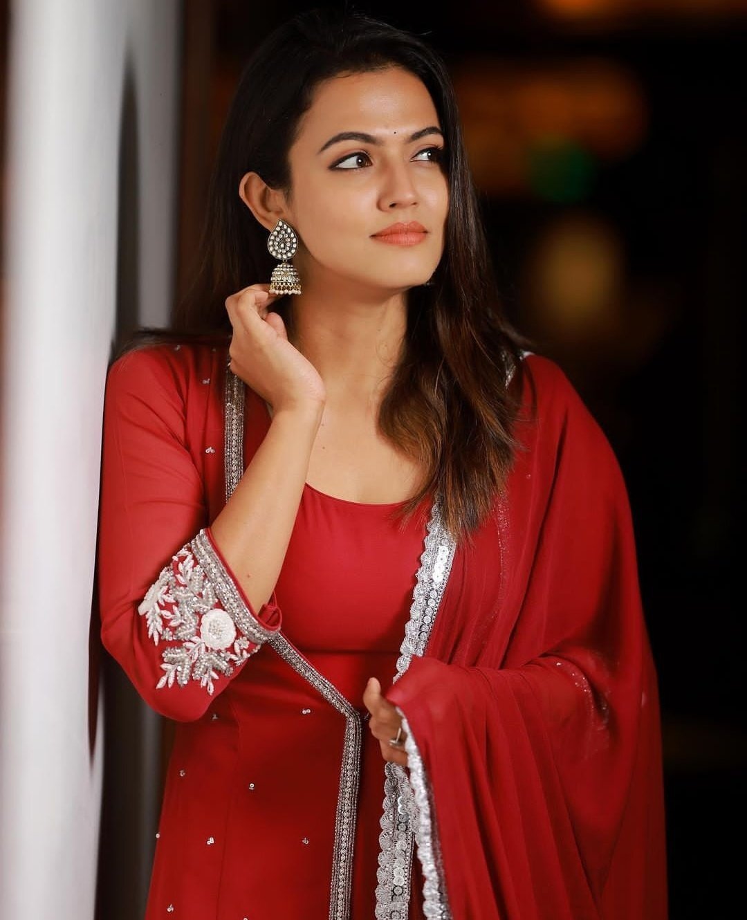 Aparna Das: Ethereal Elegance in Golden Hues