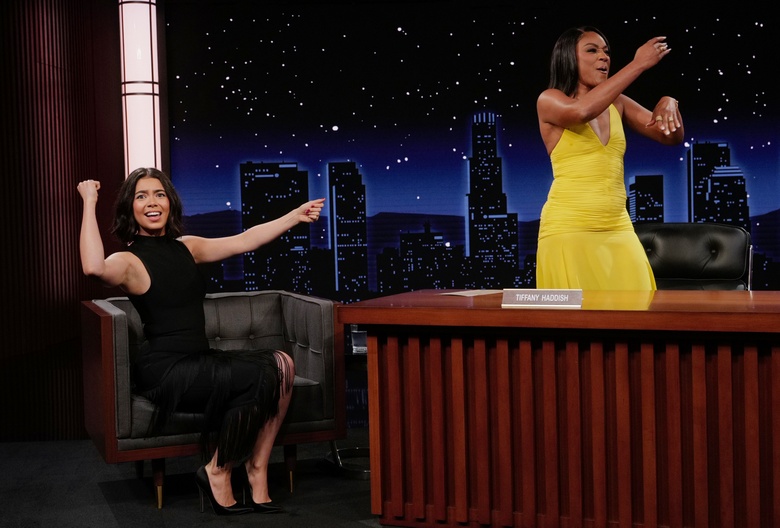Auli Cravalho looks glamorous and poised while attending a major television event taping.