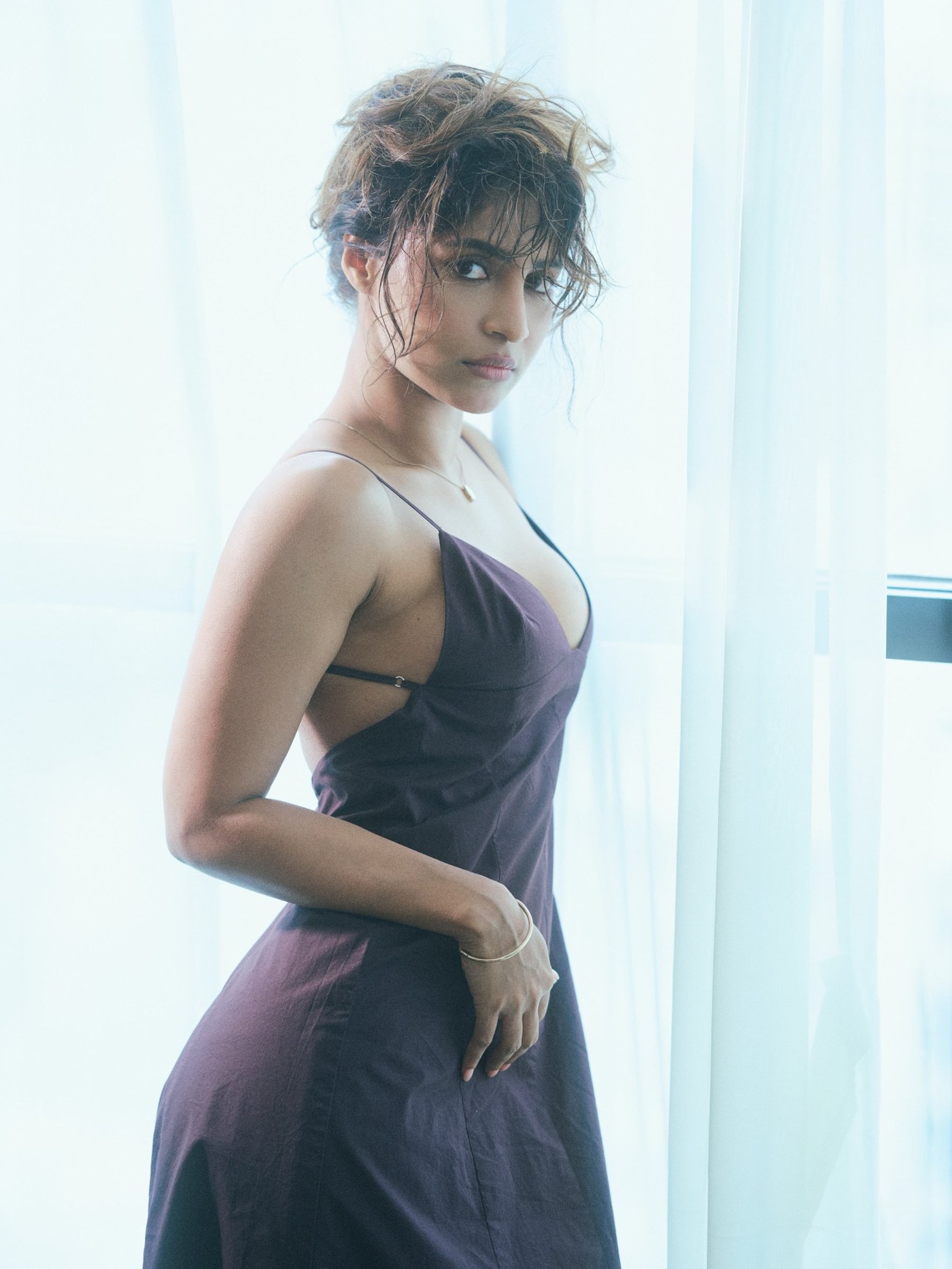 Ayra Krishna showcases a mysterious and sophisticated style in luxurious satin tones, embodying effortless modern femininity.