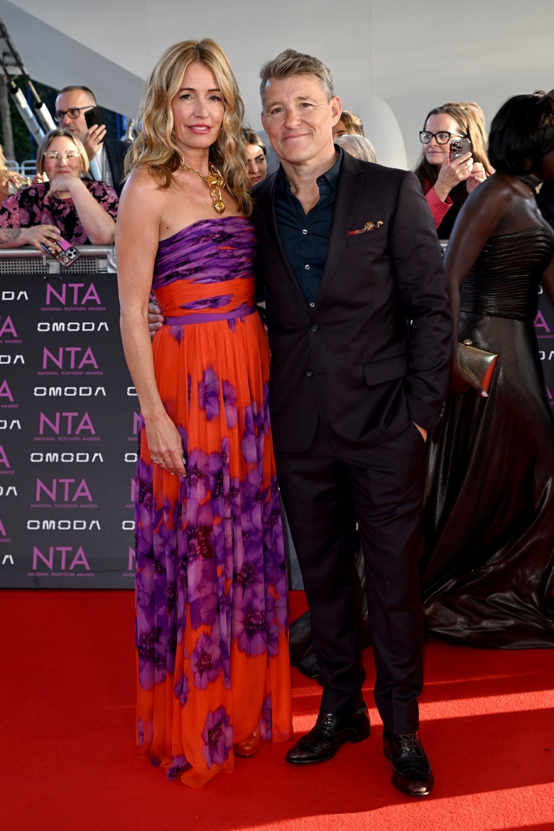 Cat Deeley is captured on the red carpet, radiating glamour at the National Television Awards in London. - Photos & Updates