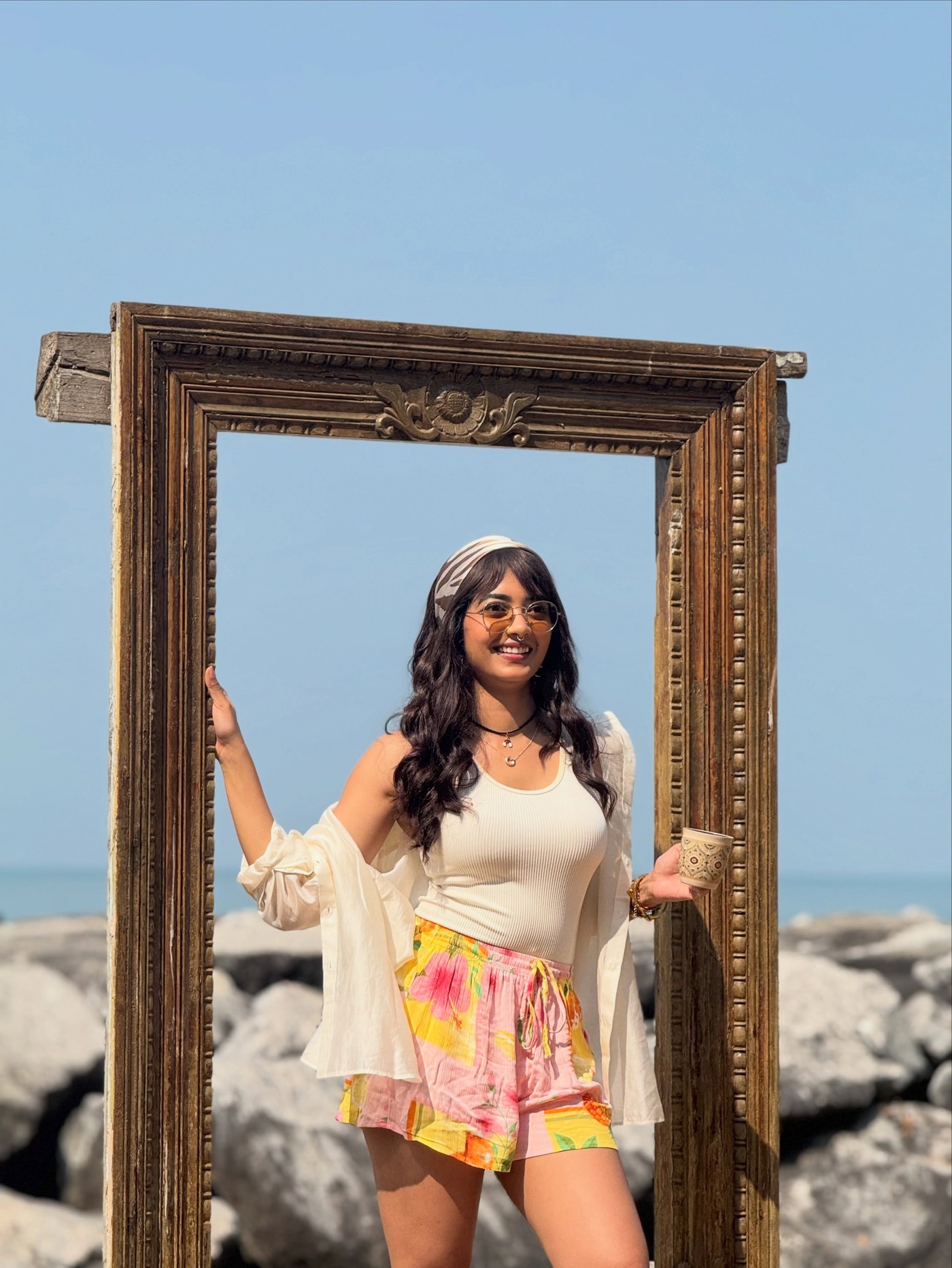 Saisha in a relaxed daytime look featuring bright floral shorts. - Photos & Updates