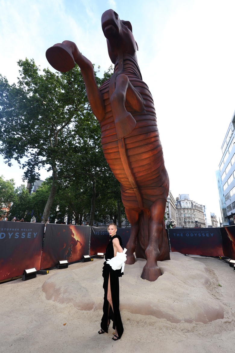 Charlize Theron Owns the Red Carpet at 'The Odyssey' World Premiere