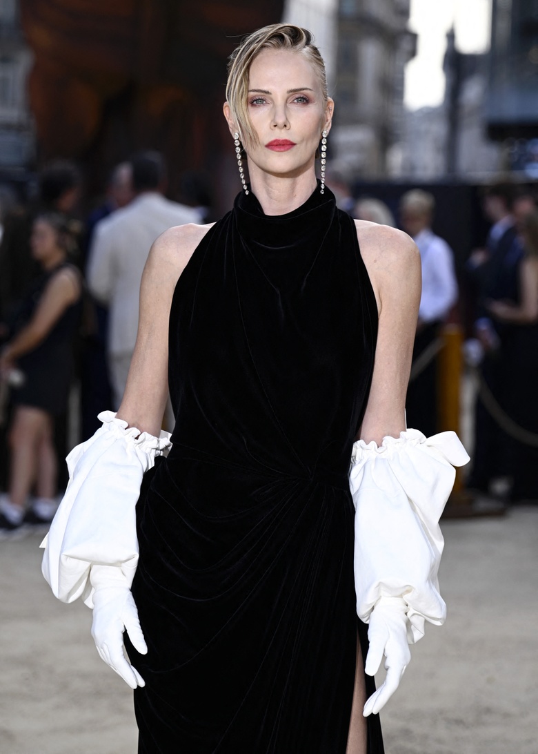 Charlize Theron Owns the Red Carpet at 'The Odyssey' World Premiere