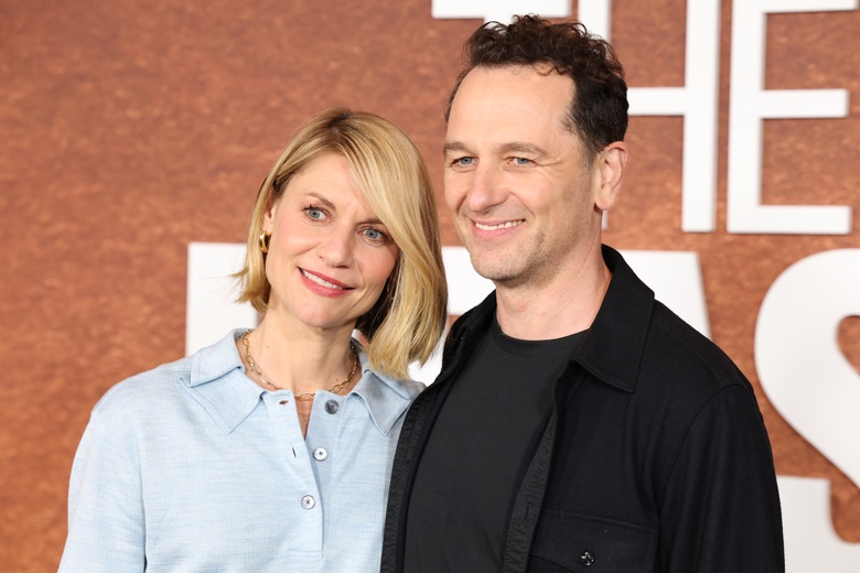 Claire Danes posing gracefully at a formal event, showcasing elegant attire.