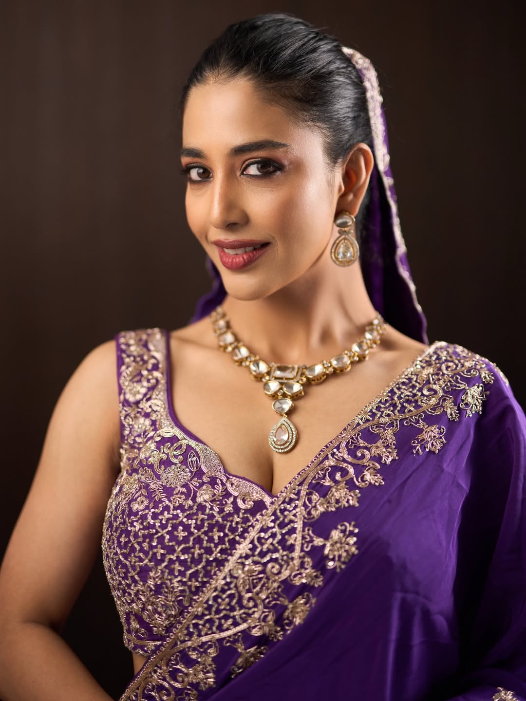 Daksha Nagarkar showcases a rich purple saree look. - Photos & Updates