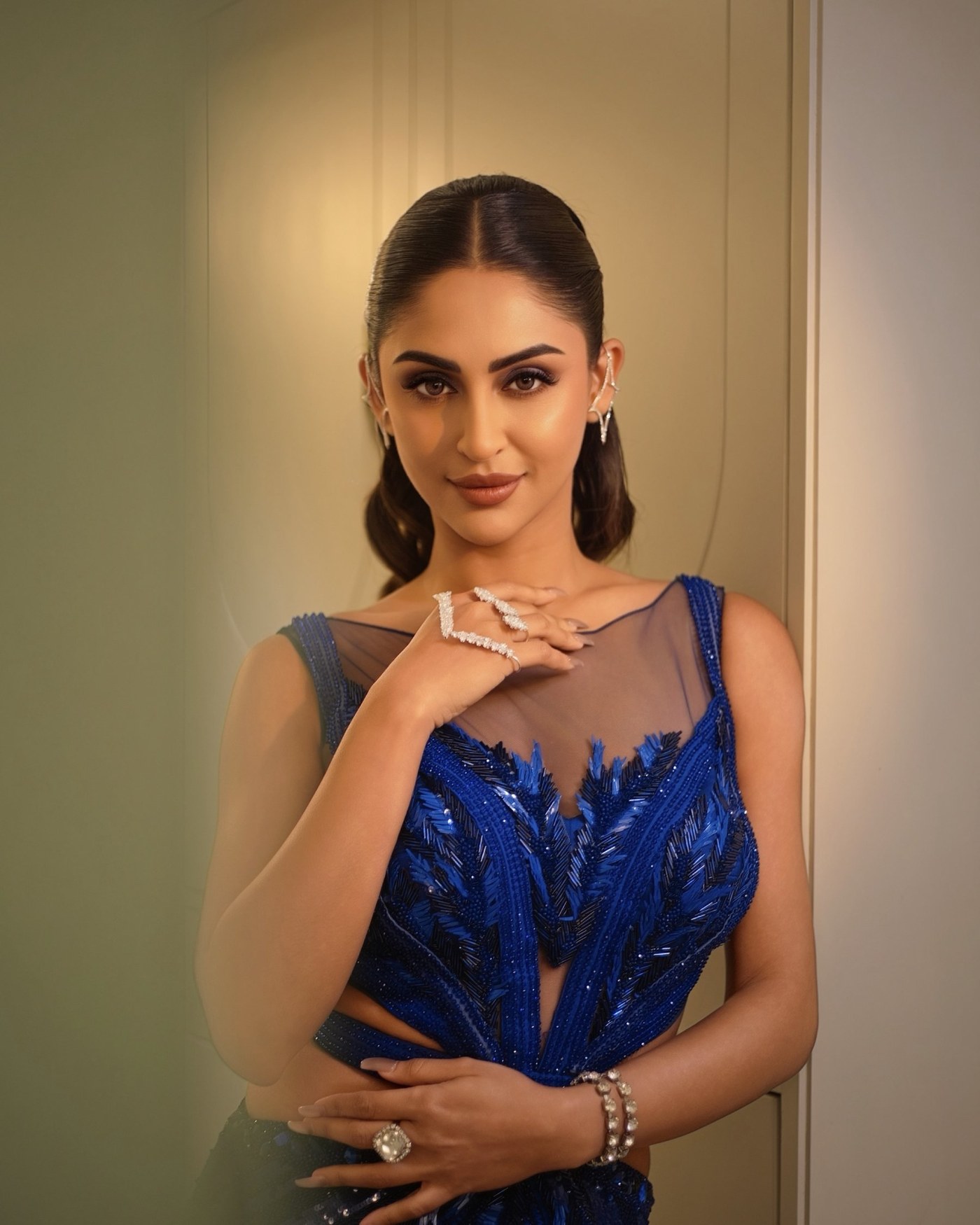 Krystle D Souza radiates sophisticated elegance in a deep blue, intricately detailed evening gown at a major event. - Photos & Updates