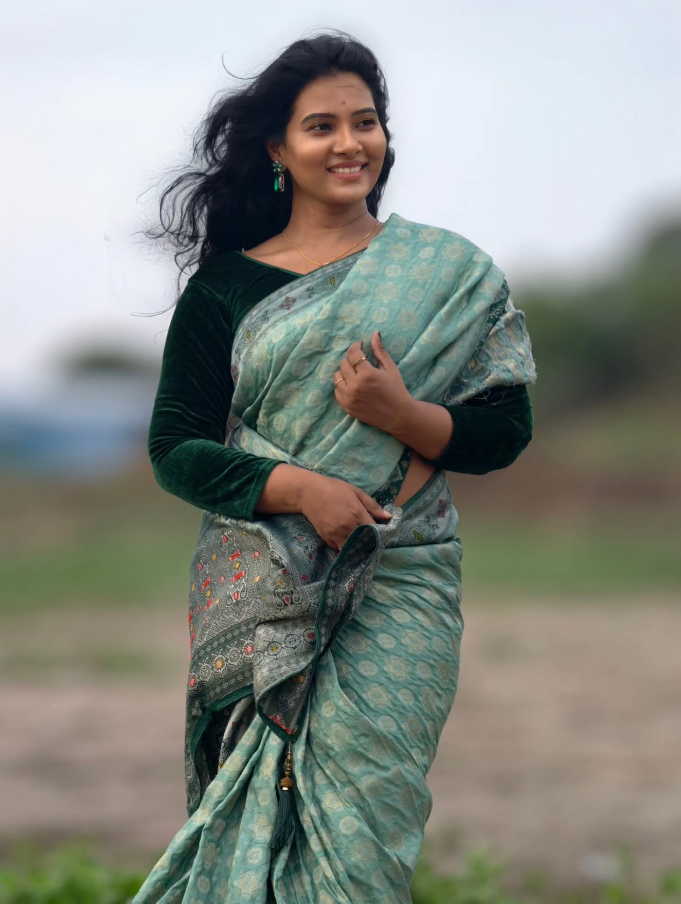Dhivya Duraisamy showcases a refreshing and elegant traditional ensemble perfect for celebrating Indian culture. - Photos & Updates