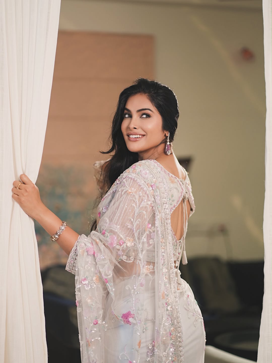 Divi Vadthya in sheer white saree with pastel floral embroidery - Photos & Updates
