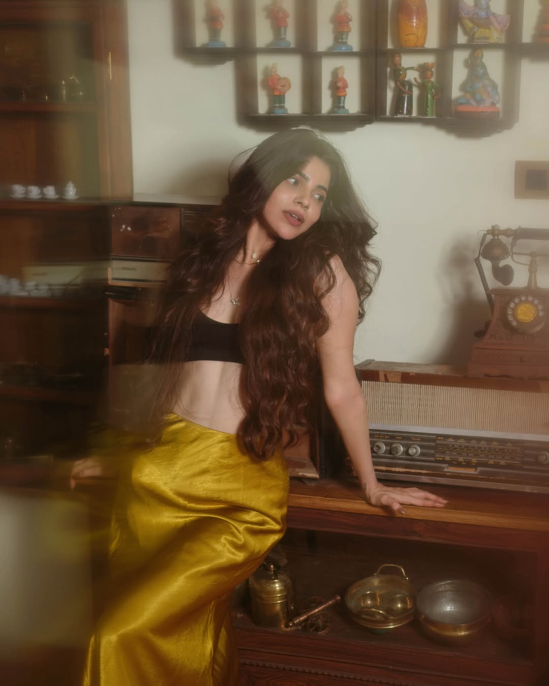 Divya Bharathi’s Latest Photoshoot: Glowing in Gold and Black!