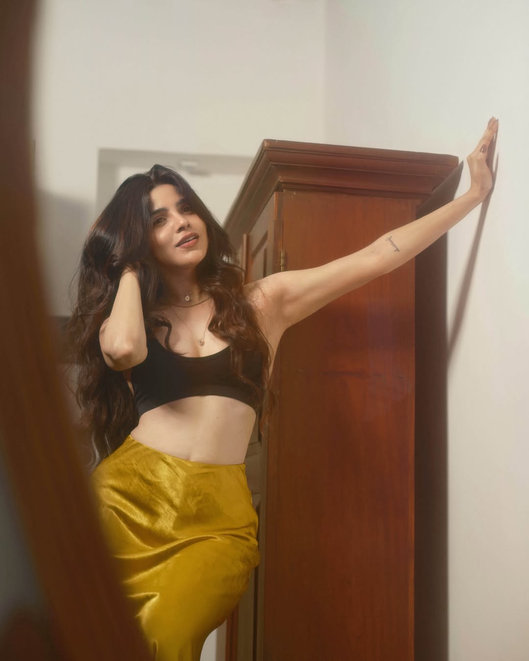 Divya Bharathi’s Latest Photoshoot: Glowing in Gold and Black!