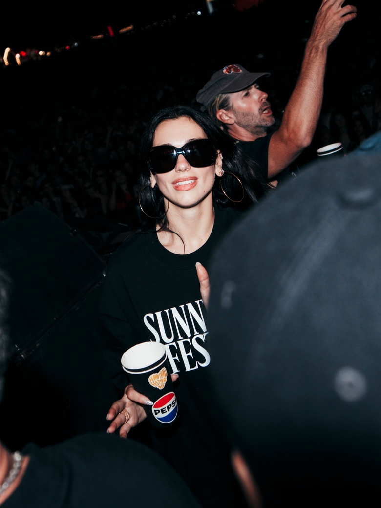 Dua Lipa Glows Up: Effortless Chic at the Sunny Hill Festival!