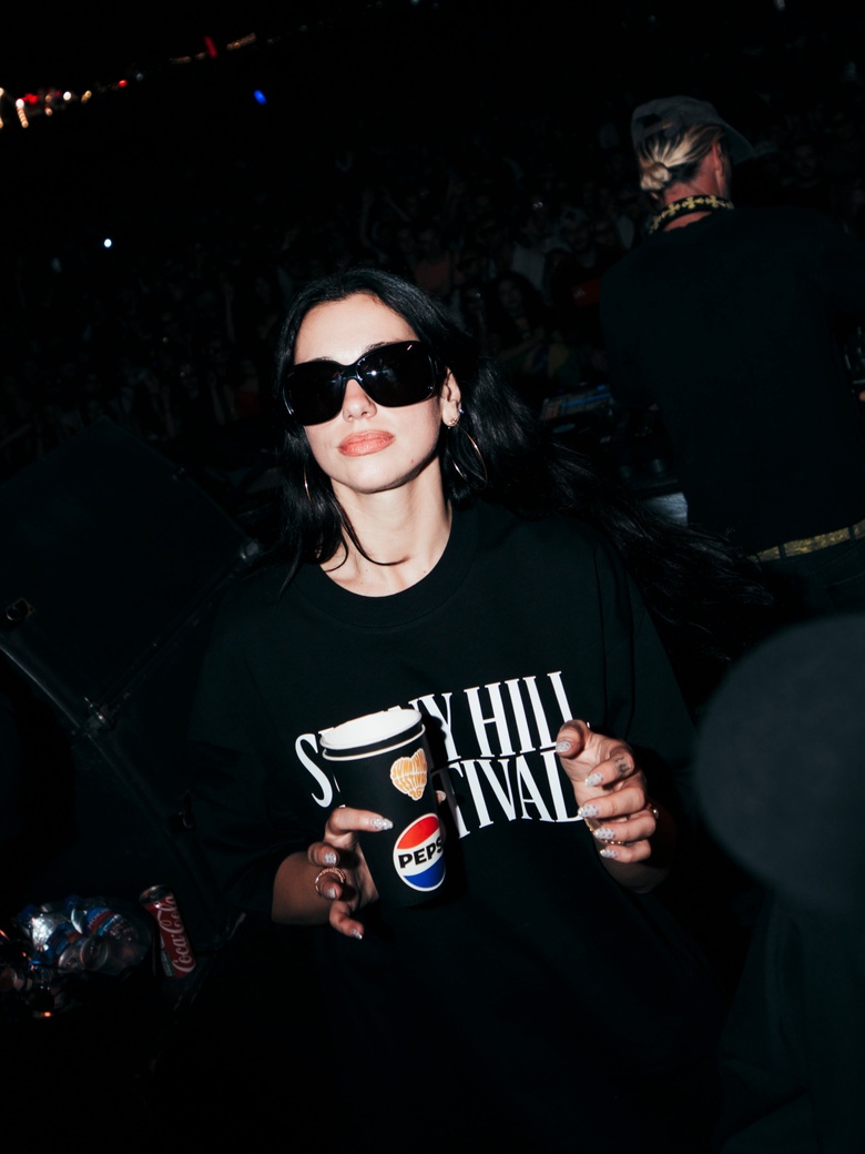 Dua Lipa Glows Up: Effortless Chic at the Sunny Hill Festival!