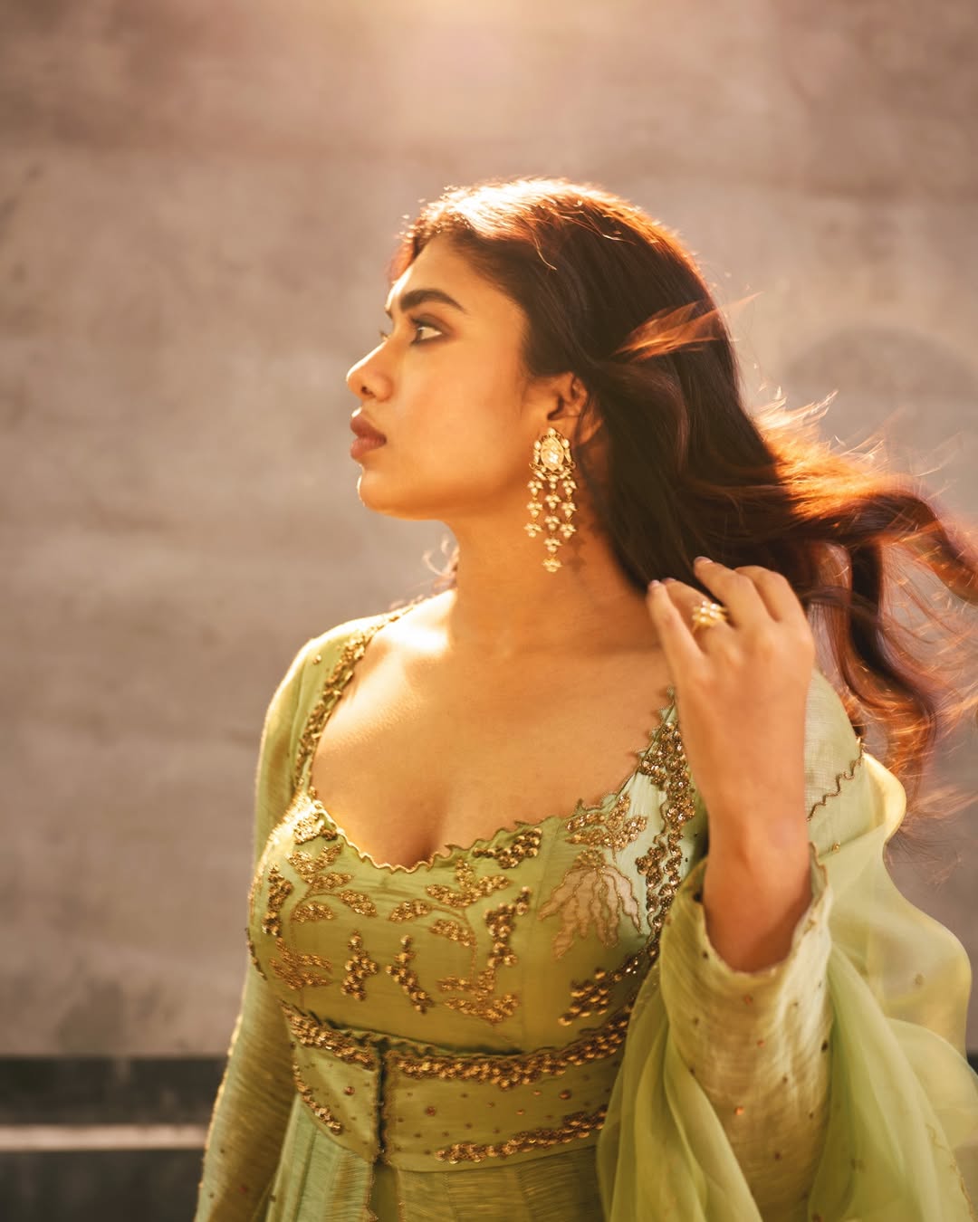 Dushara Vijayan's Ethereal Green Ensemble Captures Attention