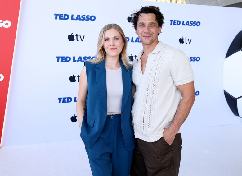 Eliza Taylor poses gracefully at a premiere, radiating classic hollywood glamour and confidence. - Photos & Updates