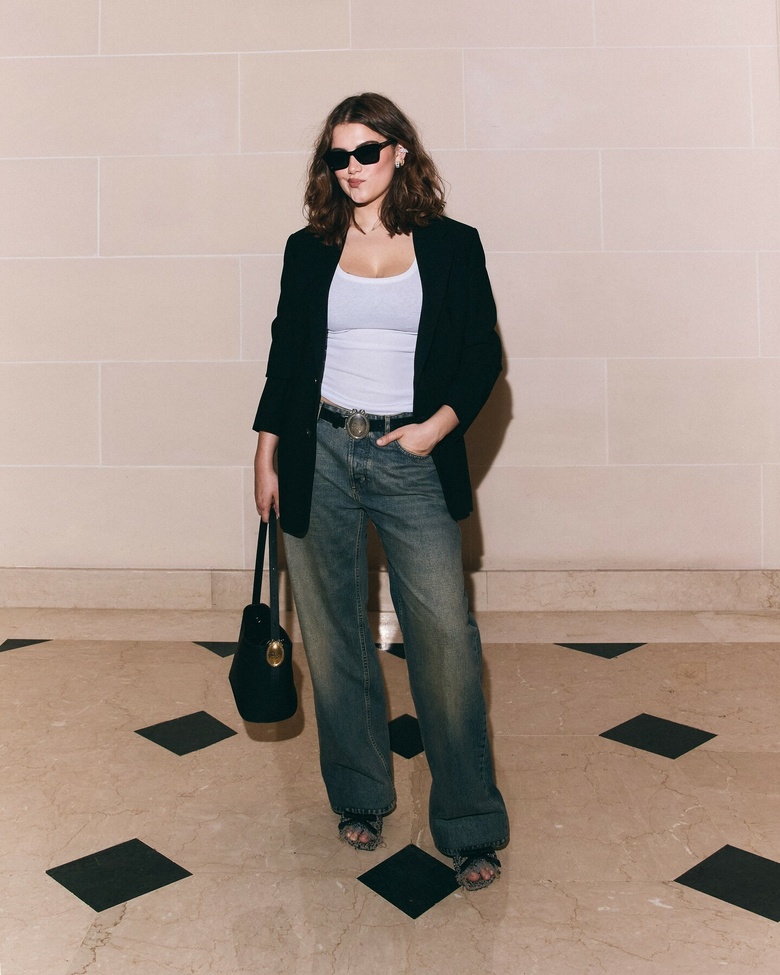 Ella Bright makes a glamorous entrance while attending a high-profile fashion event in Paris.