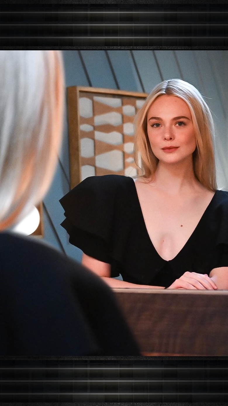 Elle Fanning posing elegantly in a stunning outfit at the event.