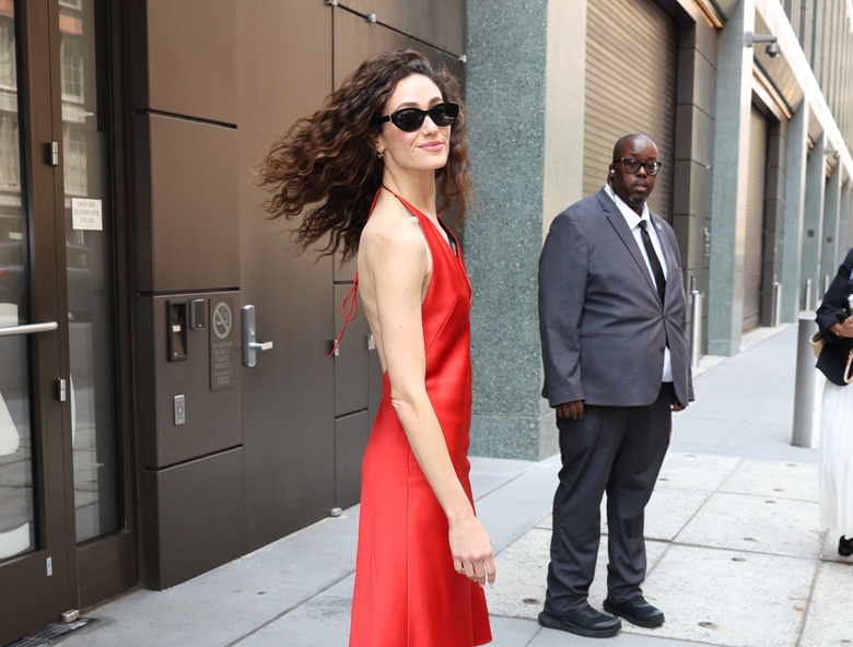 Emmy Rossum is seen attending a high-profile event, radiating grace and sophistication. - Photos & Updates