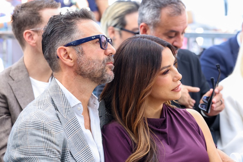 Eva Longoria poses beautifully with David Beckham at a Hollywood Walk of Fame Star Ceremony event.