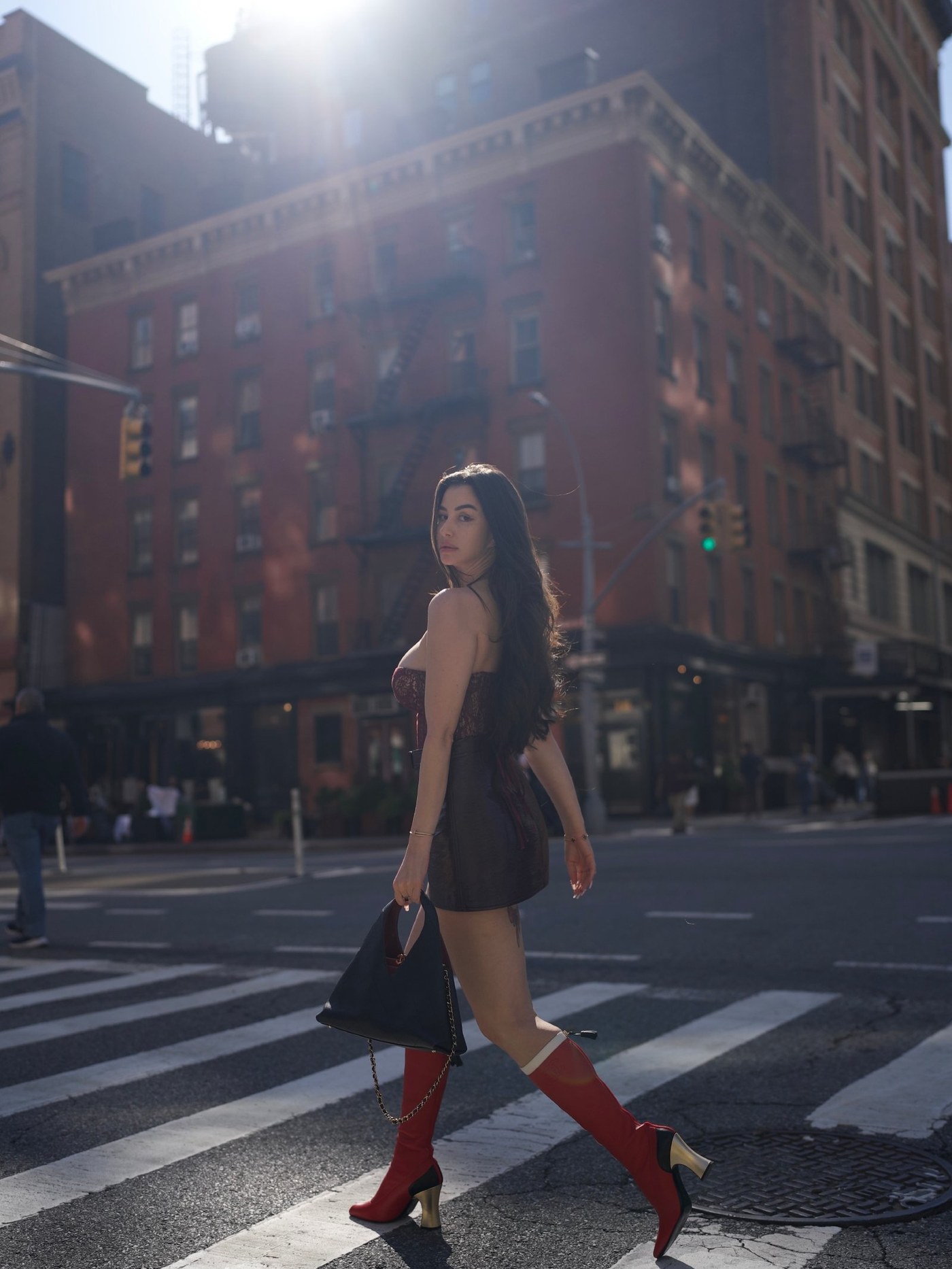 Giorgia Andriani Turns Heads with Bold Burgundy and Red Boots