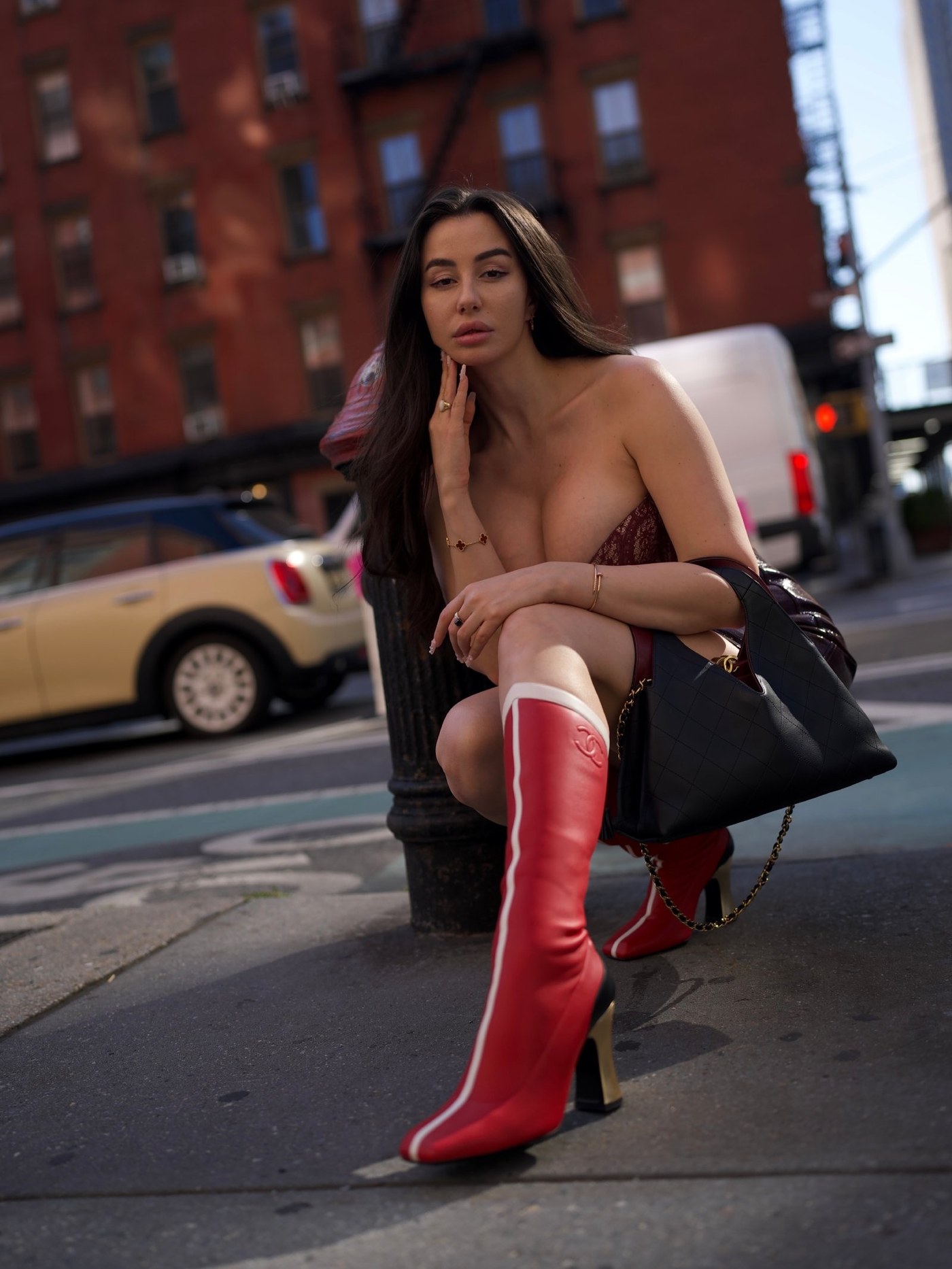 Giorgia Andriani Turns Heads with Bold Burgundy and Red Boots