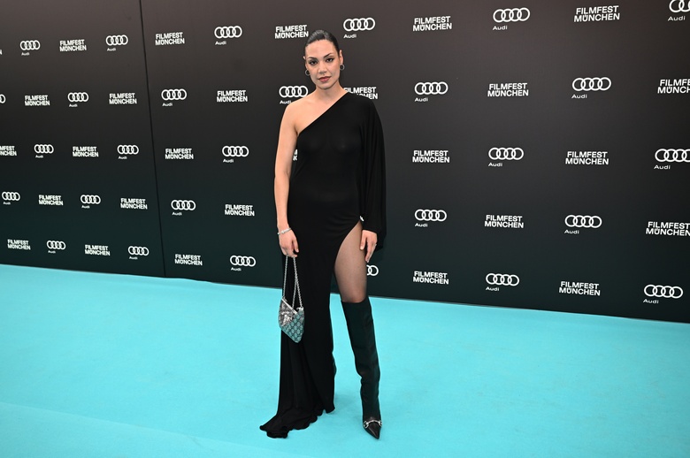 Hailey Louise Jones is seen shining brightly on the red carpet at the 43rd Munich Film Festival opening event.